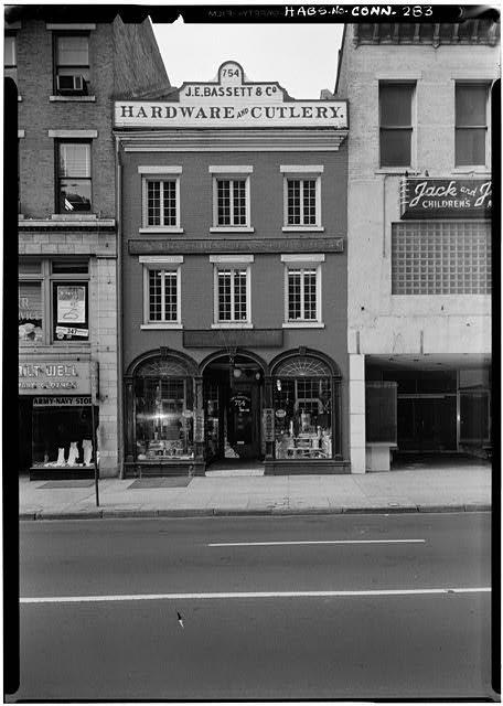 Photo of the J. E. Bassett hardware store in New Haven, after 1933. 