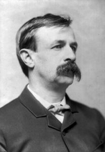 Photo of Edward Bellamy looking to the right wiht large handlebar mustache