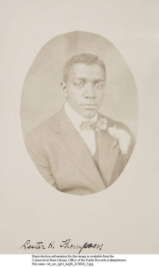 Sepia oval-shaped photograph of Lester H. Thompson on paper with his signature appended at the bottom of the backing sheet. 